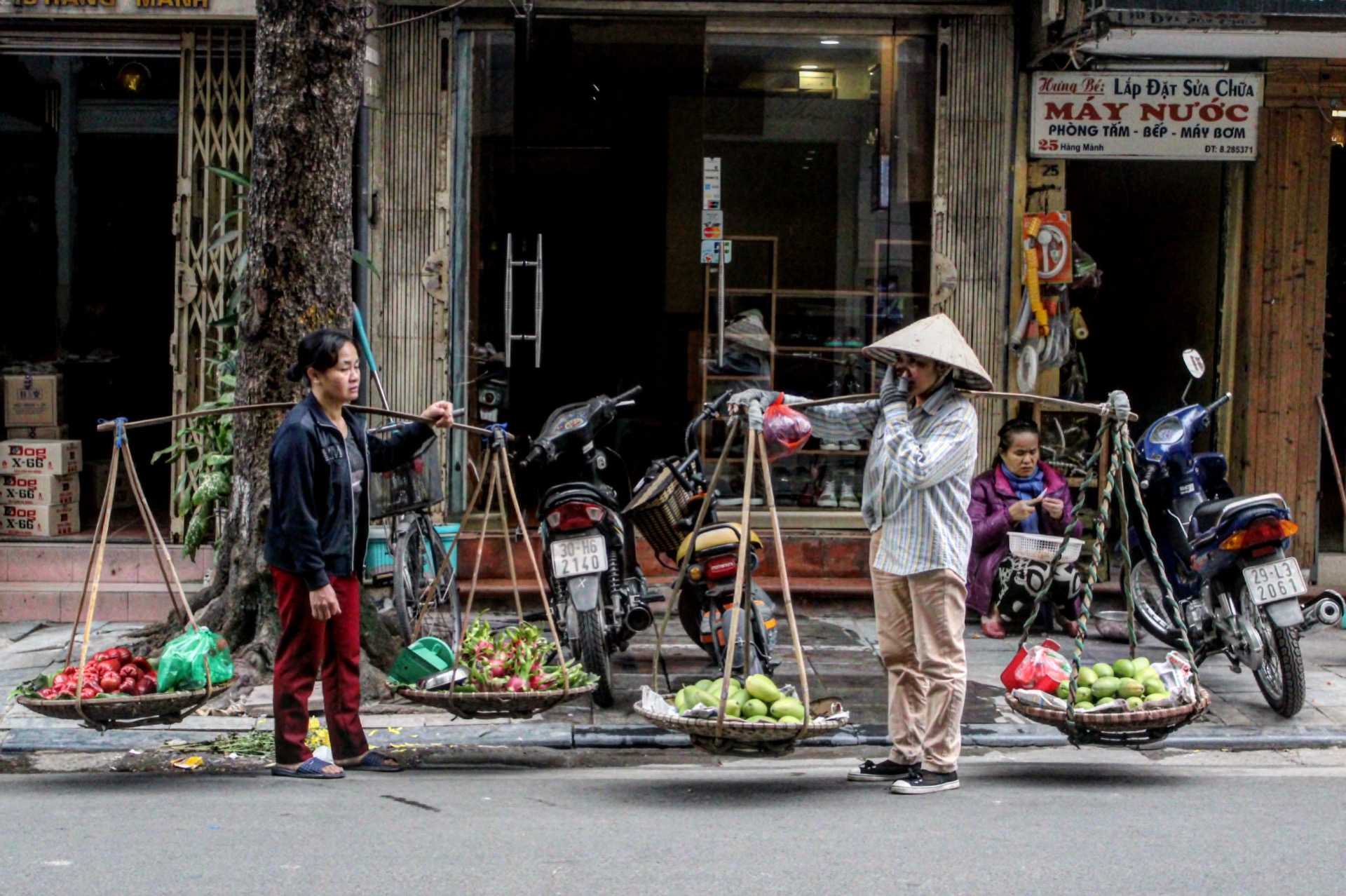 Fruit Vendor Friends In Hanoi, Vietnam