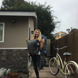 Larissa Bodniowycz with double backpack heading out to Banff, Canada from Encinitas, California